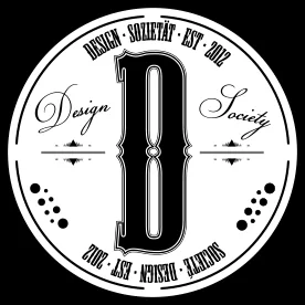 Design Society emblem: a circular seal with a large ornamental D, in black and white